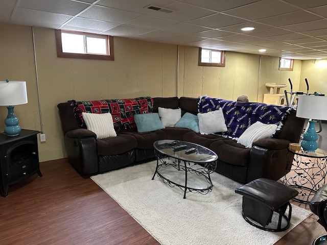 706 28th St, Cloquet, MN 55720 - living room featuring a drop ceiling, wood finished floors, and healthy amount of natural light