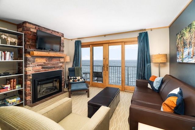 21 E Wisconsin St Unit 301, Grand Marais, MN 55616 - living room featuring crown molding, a fireplace, and french doors