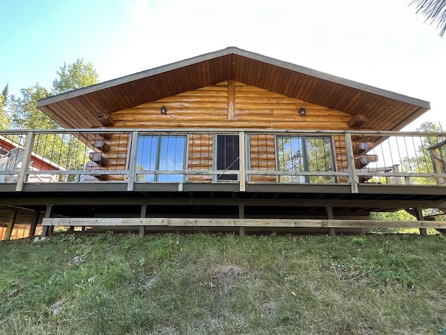 109 Tom Overlook Trl, Hovland, MN 55606 - rear view of house with faux log siding
