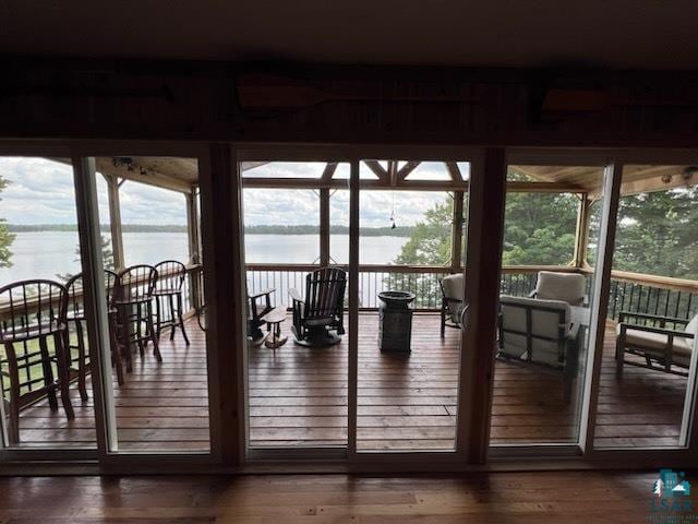 444 Fernberg Rd Unit 11, Ely, MN 55731 - interior space featuring a water view and plenty of natural light