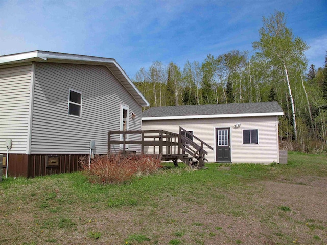 296 Cramer Rd, Schroeder, MN 55613 - view of home's exterior with a deck