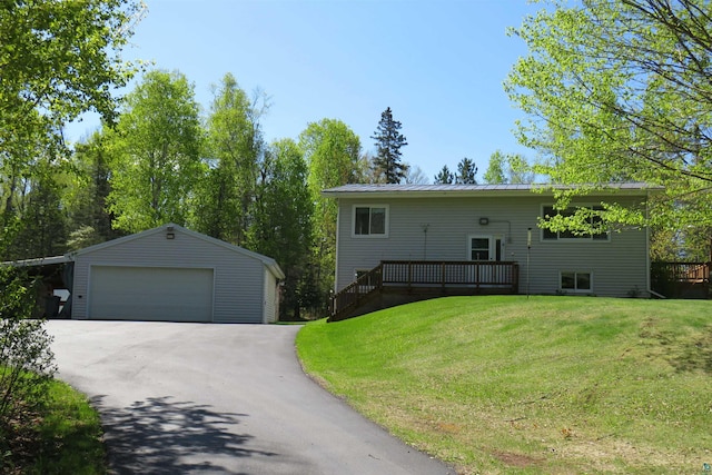 2984 Hagen Rd, Duluth, MN 55804 - view of front of home featuring a garage, an outdoor structure, a deck, and a front lawn