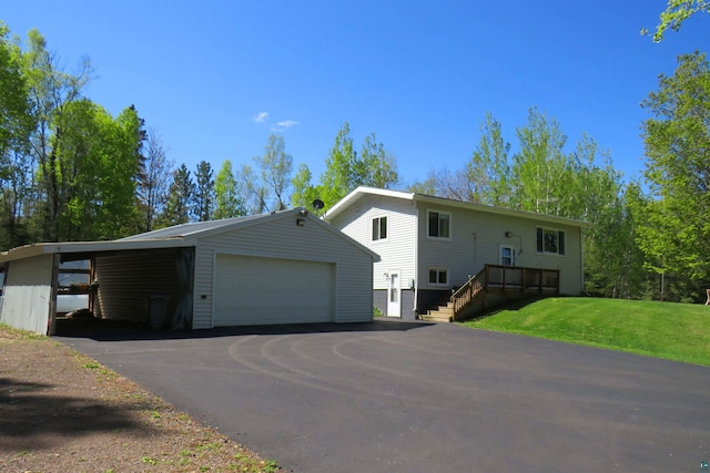 2984 Hagen Rd, Duluth, MN 55804 - view of front of house with a detached garage, an outdoor structure, and a front yard