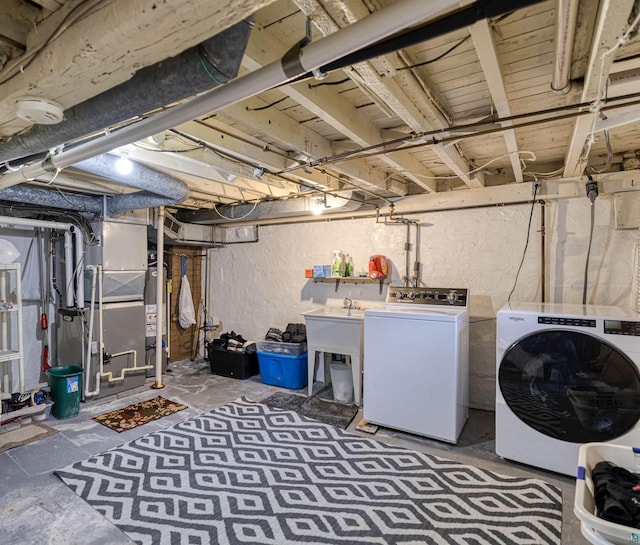 405 10th Ave, Two Harbors, MN 55616 - unfinished below grade area with washer and clothes dryer and heating unit