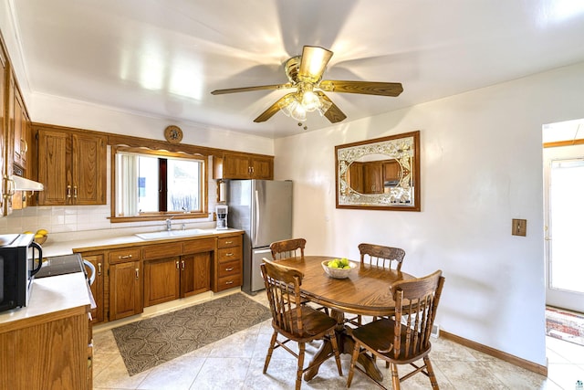 405 10th Ave, Two Harbors, MN 55616 - dining space with light tile patterned flooring and ceiling fan