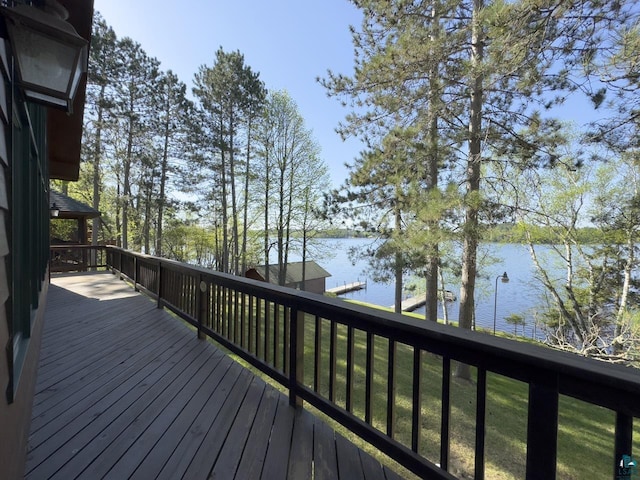 1880 S Everett Rd, Tower, MN 55790 - wooden deck featuring a water view and a dock