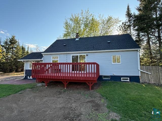 710 N Boundary Ave, Duluth, MN 55810 - back of house featuring a deck, a chimney, and a shingled roof