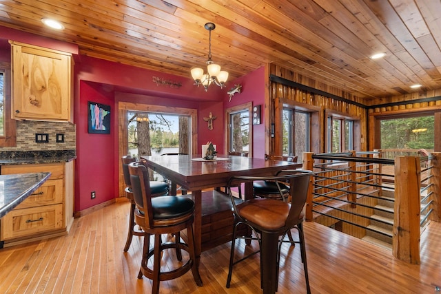 8845 Pequaywan Lake Rd, Duluth, MN 55803 - dining room featuring wood ceiling, a chandelier, light wood-style floors, recessed lighting, and baseboards