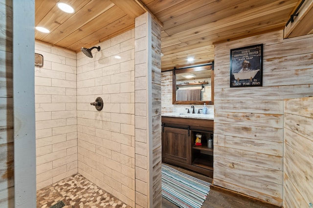 8845 Pequaywan Lake Rd, Duluth, MN 55803 - bathroom featuring tiled shower, wood ceiling, and vanity