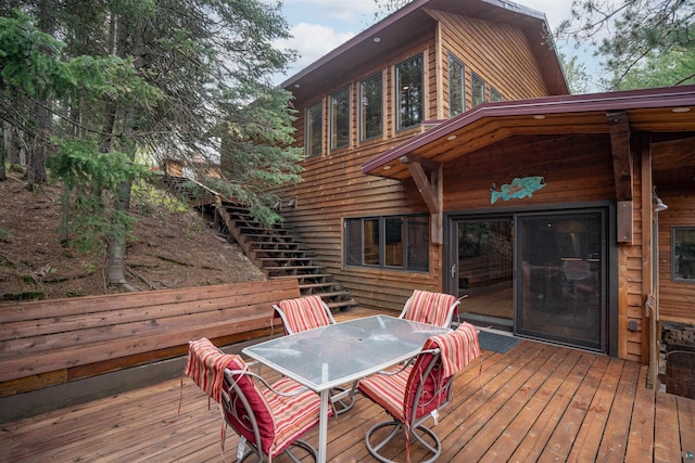 8845 Pequaywan Lake Rd, Duluth, MN 55803 - wooden terrace with stairs and outdoor dining space