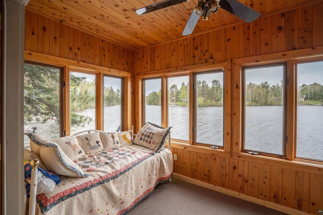 8845 Pequaywan Lake Rd, Duluth, MN 55803 - bedroom featuring wood walls, a water view, wooden ceiling, carpet, and lofted ceiling