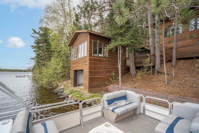 8845 Pequaywan Lake Rd, Duluth, MN 55803 - wooden deck with a water view