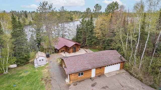 8845 Pequaywan Lake Rd, Duluth, MN 55803 - view from above of property with a heavily wooded area and a nearby body of water
