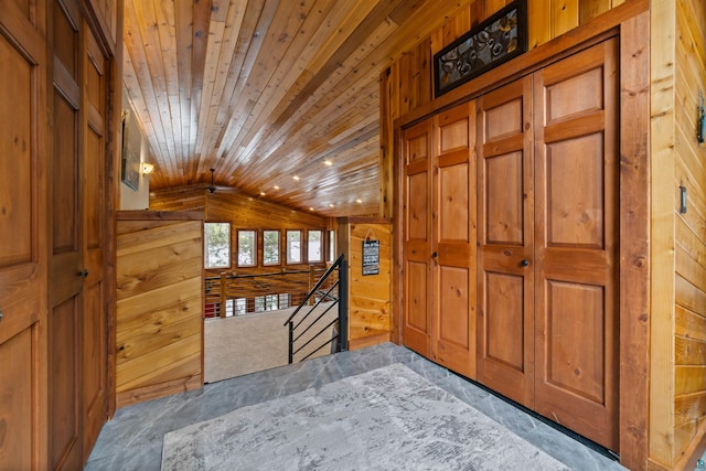 8845 Pequaywan Lake Rd, Duluth, MN 55803 - foyer with wood walls, lofted ceiling, and wood ceiling