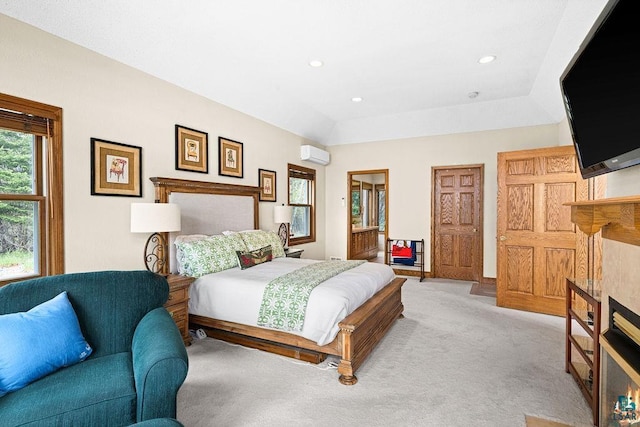 5491 N Shore Dr, Duluth, MN 55804 - bedroom featuring an AC wall unit, light colored carpet, a warm lit fireplace, and recessed lighting