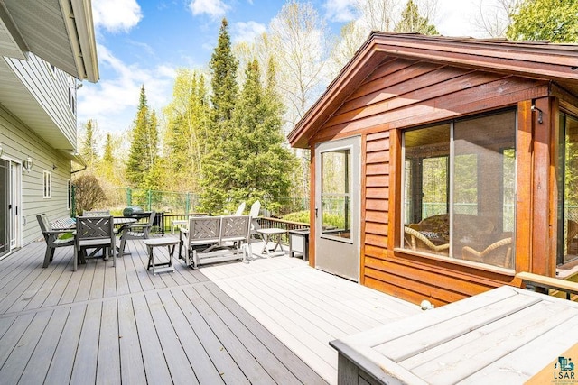 5491 N Shore Dr, Duluth, MN 55804 - wooden deck with outdoor dining area