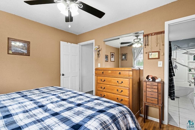 5152 Martin Rd, Duluth, MN 55811 - bedroom featuring ceiling fan and wood finished floors