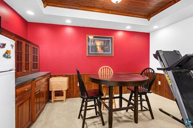 5152 Martin Rd, Duluth, MN 55811 - dining room featuring wood ceiling, a tray ceiling, light colored carpet, recessed lighting, and wood walls