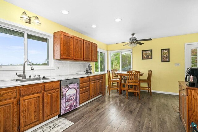 5152 Martin Rd, Duluth, MN 55811 - kitchen with dishwasher, a sink, ceiling fan, plenty of natural light, and recessed lighting