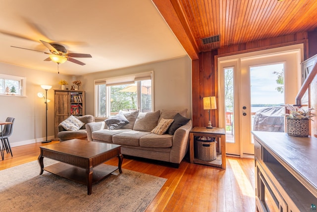 13359 Villa Rd, Ely, MN 55731 - living area with light wood-style flooring, a ceiling fan, and baseboards