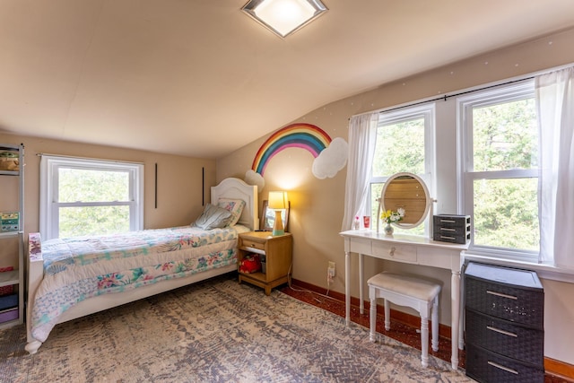 13359 Villa Rd, Ely, MN 55731 - bedroom with multiple windows, vaulted ceiling, and baseboards