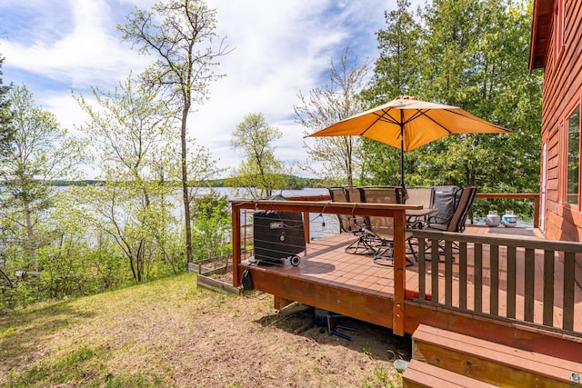 13359 Villa Rd, Ely, MN 55731 - wooden terrace featuring outdoor dining space