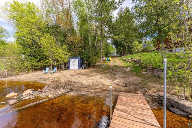 13359 Villa Rd, Ely, MN 55731 - dock with view of wooded area