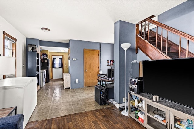214 5th St, Proctor, MN 55810 - living room with stairway and wood finished floors