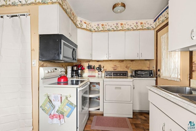 11 Aiken Crk, Silver Bay, MN 55614 - kitchen featuring white electric range oven, stainless steel microwave, washer and dryer, and white cabinetry