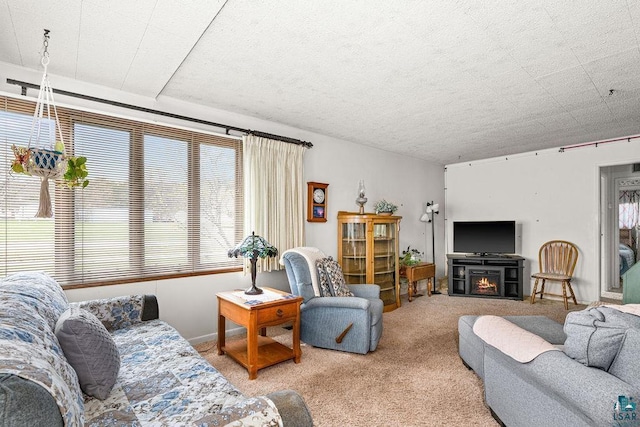 11 Aiken Crk, Silver Bay, MN 55614 - carpeted living area featuring a lit fireplace