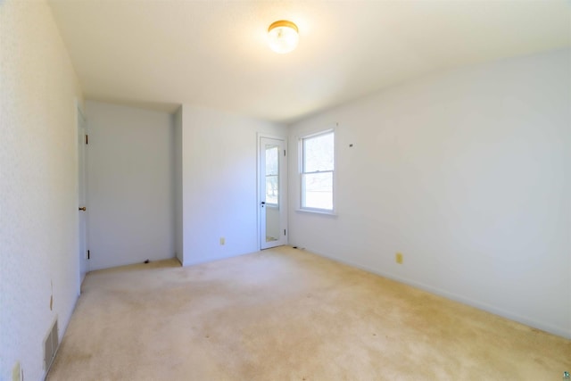 335 E Willow St, Duluth, MN 55811 - unfurnished bedroom featuring light carpet
