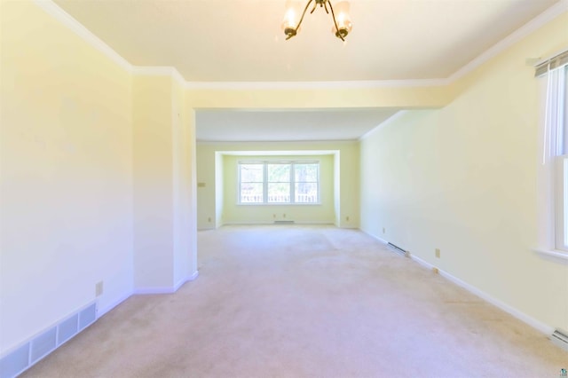 335 E Willow St, Duluth, MN 55811 - spare room featuring light carpet, ornamental molding, and baseboards