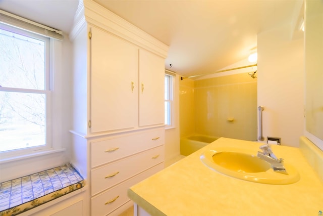 335 E Willow St, Duluth, MN 55811 - full bath with healthy amount of natural light, vanity, and  shower combination