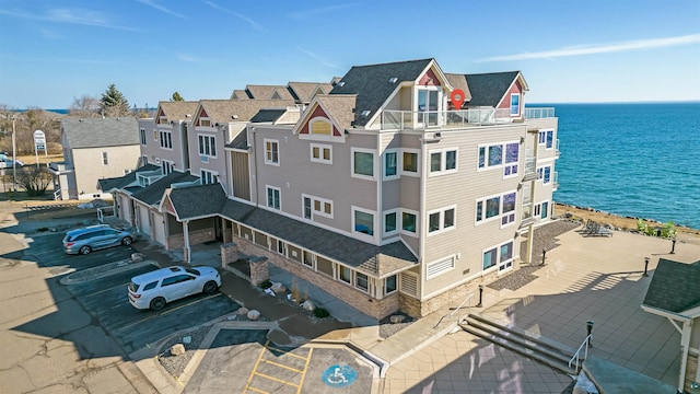 2126 Water St Unit L306, Duluth, MN 55812 - view of property featuring a water view and uncovered parking