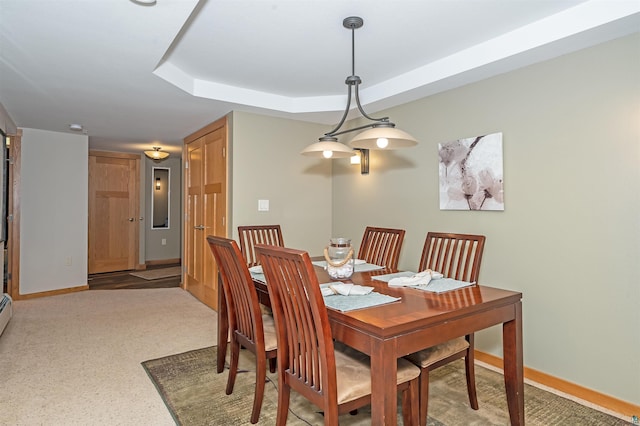 2126 Water St Unit L306, Duluth, MN 55812 - dining space featuring baseboards and a tray ceiling