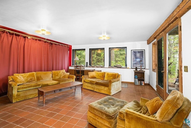 4015 E Van Rd, Duluth, MN 55803 - living room featuring dark tile patterned flooring and baseboards