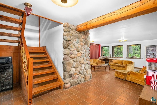 4015 E Van Rd, Duluth, MN 55803 - staircase with wine cooler, tile patterned flooring, and beam ceiling