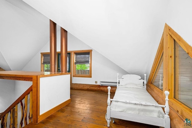 4015 E Van Rd, Duluth, MN 55803 - bedroom with baseboard heating, vaulted ceiling, and wood-type flooring