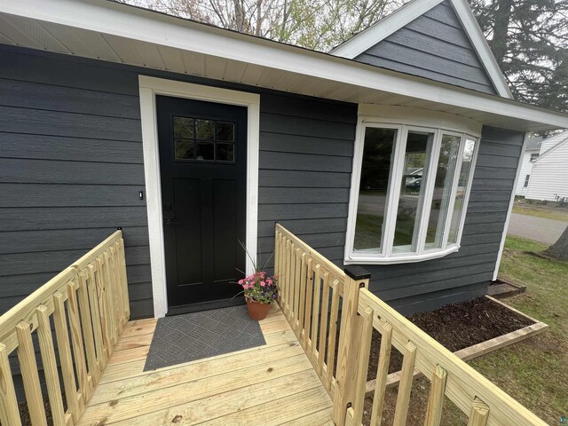 10 Canosia Rd, Esko, MN 55733 - view of exterior entry with a deck