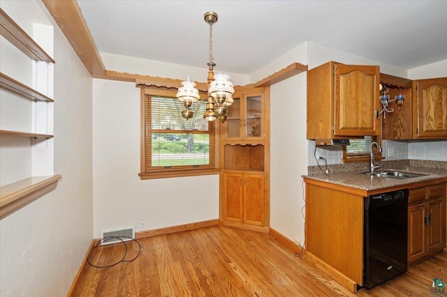 5526 W 8th St, Duluth, MN 55807 - kitchen featuring black dishwasher, a sink, brown cabinets, and light wood-style flooring