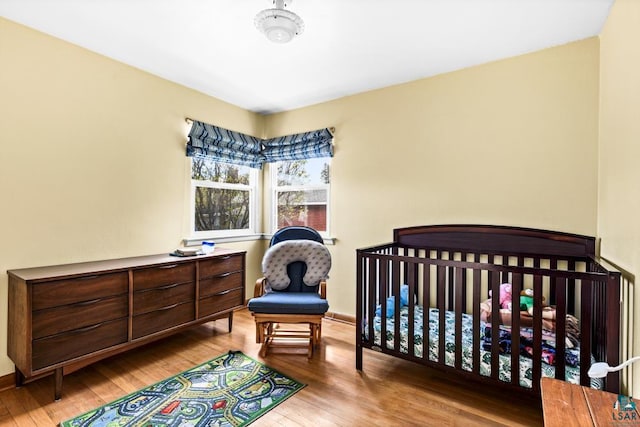 2611 Chambersburg Ave, Duluth, MN 55811 - bedroom with hardwood / wood-style flooring and baseboards