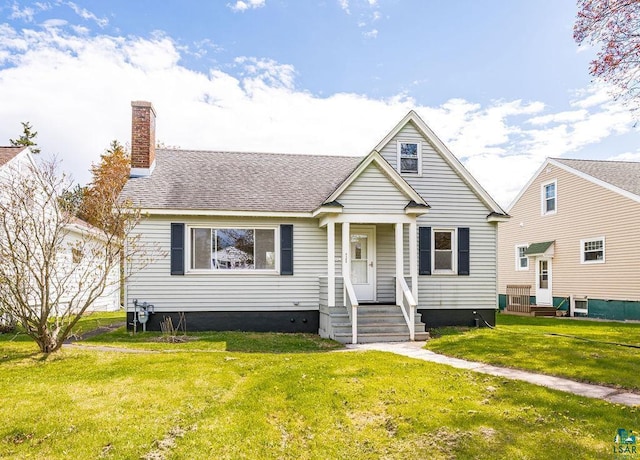 4124 Gilliat St, Duluth, MN 55804 - bungalow-style house featuring a chimney, a front lawn, and a shingled roof