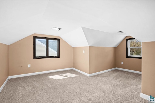 4124 Gilliat St, Duluth, MN 55804 - bonus room featuring carpet flooring, baseboards, and lofted ceiling