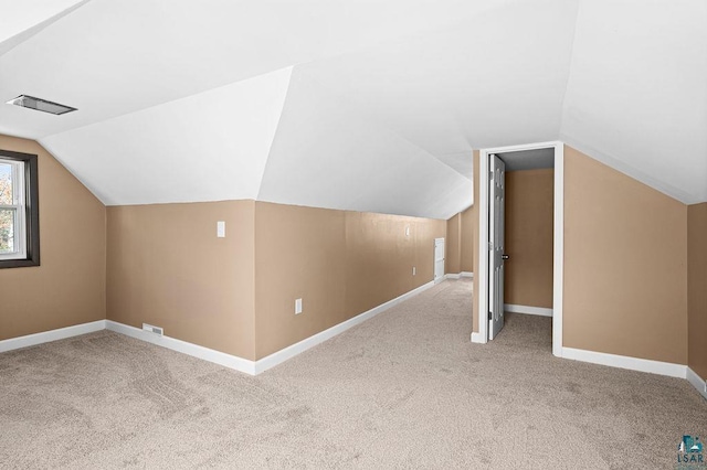 4124 Gilliat St, Duluth, MN 55804 - additional living space with baseboards, lofted ceiling, and carpet floors