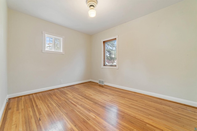2229 Hillcrest Dr, Duluth, MN 55811 - spare room featuring healthy amount of natural light, light wood finished floors, and baseboards