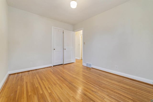 2229 Hillcrest Dr, Duluth, MN 55811 - spare room featuring baseboards and light wood-style flooring