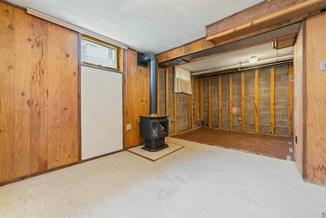 2229 Hillcrest Dr, Duluth, MN 55811 - basement with a wood stove and carpet floors