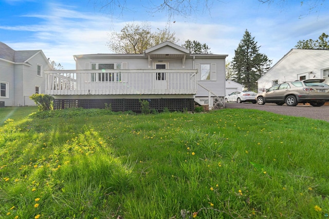 2229 Hillcrest Dr, Duluth, MN 55811 - view of front of home with a deck and a front lawn