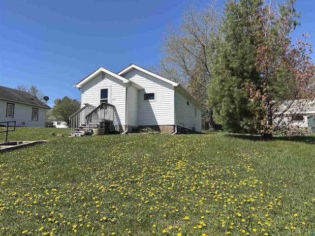 408 Midway Ave, Proctor, MN 55810 - view of home's exterior featuring a lawn
