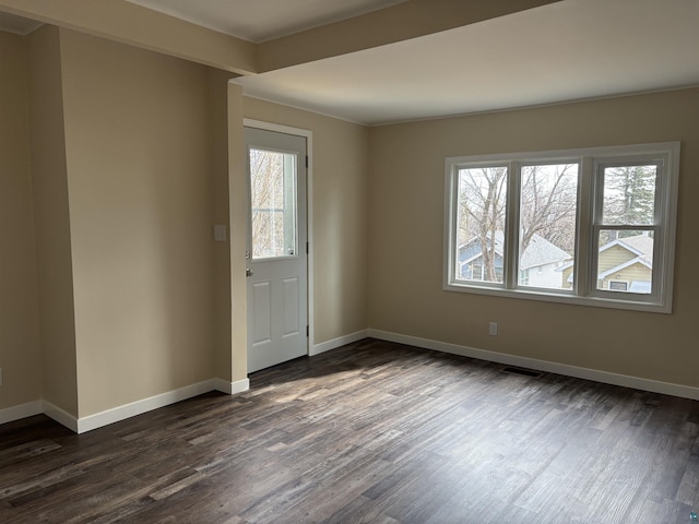 1417 N 7th Ave E, Duluth, MN 55805 - spare room with dark wood-style floors and baseboards
